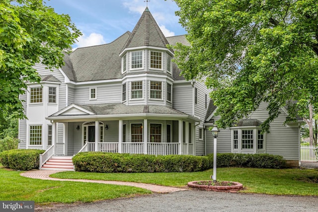 6 Benedek Rd, Princeton, NJ 08540 - victorian-style house with a porch, a front lawn, and roof with shingles