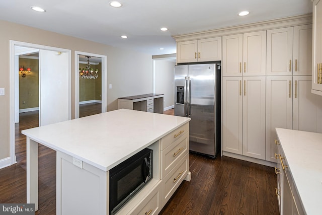 6 Benedek Rd, Princeton, NJ 08540 - kitchen with stainless steel fridge with ice dispenser, black microwave, light countertops, a chandelier, and recessed lighting