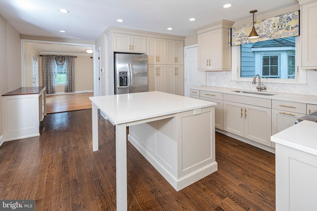 6 Benedek Rd, Princeton, NJ 08540 - kitchen with stainless steel refrigerator with ice dispenser, dark wood-style flooring, recessed lighting, a center island, and pendant lighting