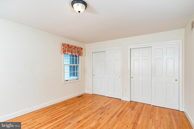6 Benedek Rd, Princeton, NJ 08540 - unfurnished bedroom featuring multiple closets and light wood-style flooring