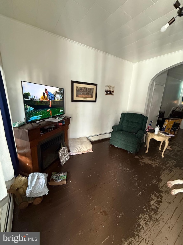 126 Birch St, Shamokin, PA 17872 - sitting room with arched walkways, hardwood / wood-style flooring, baseboard heating, and crown molding