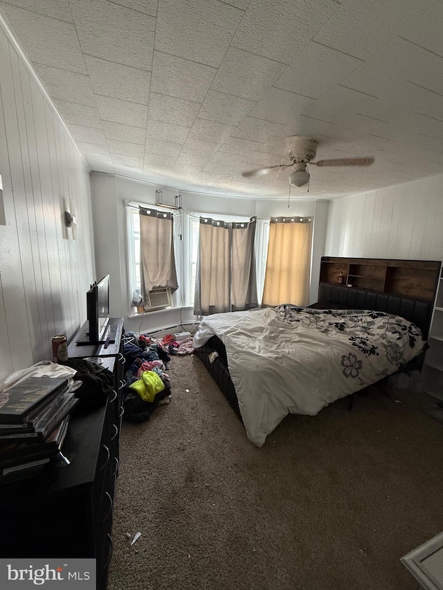 126 Birch St, Shamokin, PA 17872 - bedroom with carpet, wooden walls, and ceiling fan