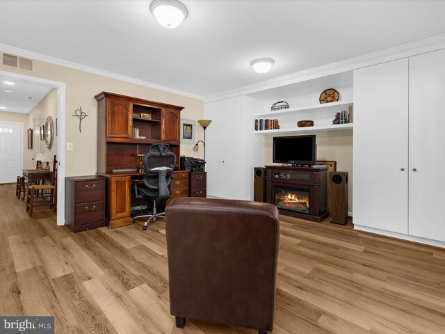1413 Peregrine Path, Arnold, MD 21012 - office with light wood-style floors, a glass covered fireplace, and crown molding
