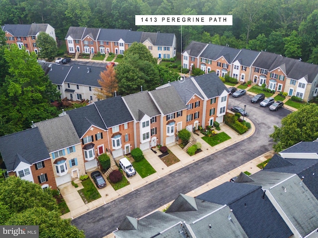 1413 Peregrine Path, Arnold, MD 21012 - aerial perspective of suburban area featuring a heavily wooded area