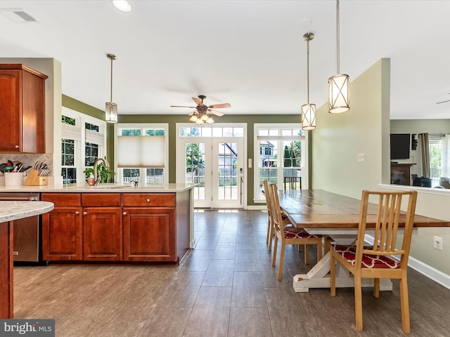 106 Bedrock Dr, Walkersville, MD 21793 - kitchen with a ceiling fan, a sink, light countertops, dishwasher, and backsplash