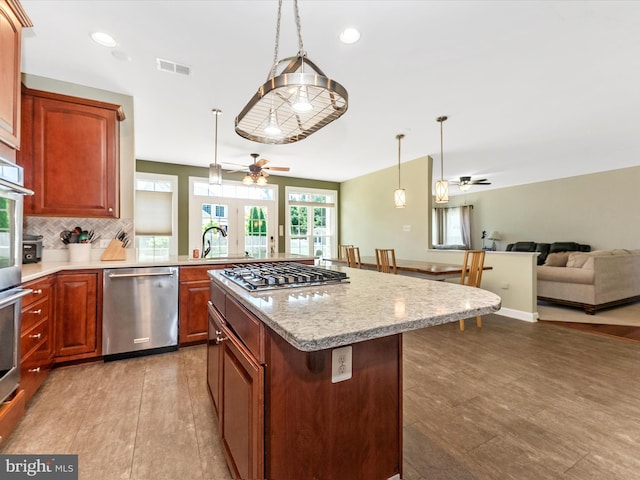 106 Bedrock Dr, Walkersville, MD 21793 - kitchen with appliances with stainless steel finishes, a ceiling fan, a sink, open floor plan, and recessed lighting