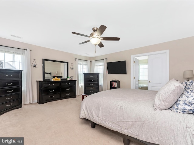 106 Bedrock Dr, Walkersville, MD 21793 - bedroom featuring multiple windows, light carpet, and ceiling fan