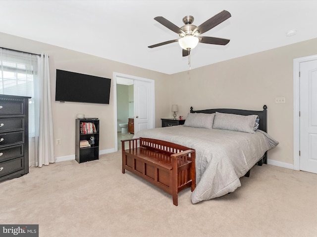 106 Bedrock Dr, Walkersville, MD 21793 - bedroom featuring light colored carpet, baseboards, ceiling fan, and ensuite bath