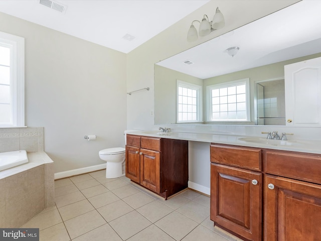 106 Bedrock Dr, Walkersville, MD 21793 - bathroom featuring tile patterned floors, vanity, a bath, a shower stall, and toilet