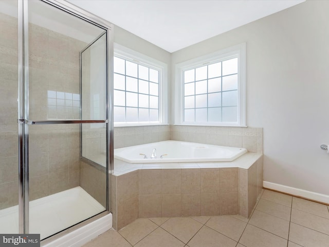 106 Bedrock Dr, Walkersville, MD 21793 - full bath with tile patterned floors, a stall shower, a bath, and baseboards