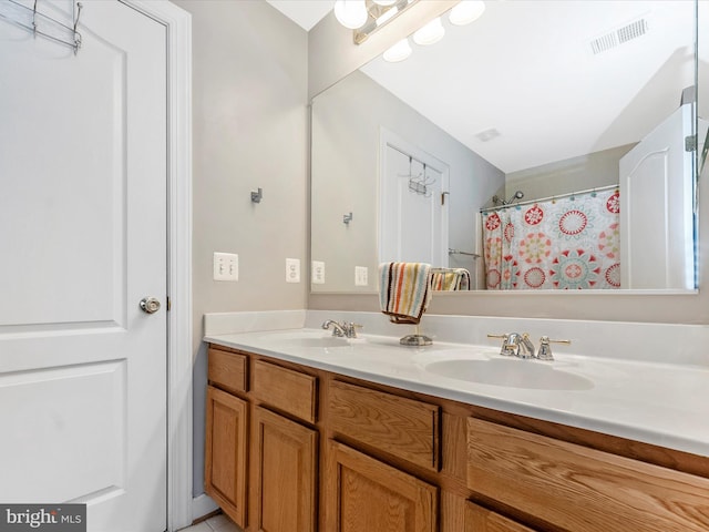 106 Bedrock Dr, Walkersville, MD 21793 - bathroom with double vanity and curtained shower