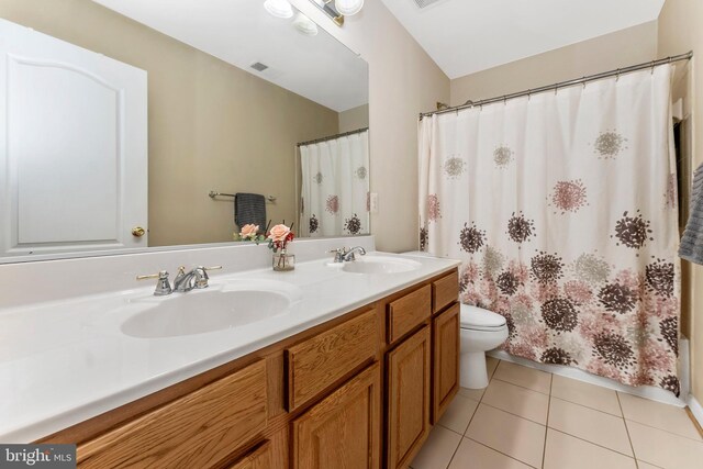 106 Bedrock Dr, Walkersville, MD 21793 - bathroom featuring tile patterned flooring, toilet, double vanity, and curtained shower