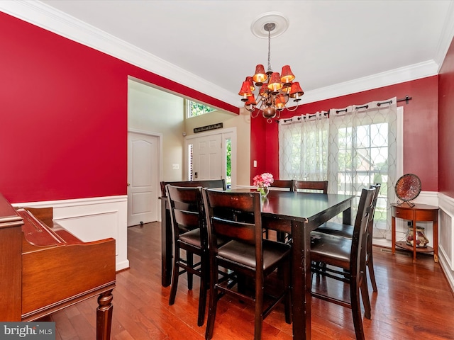 106 Bedrock Dr, Walkersville, MD 21793 - dining space with a chandelier, ornamental molding, a wainscoted wall, and wood-type flooring