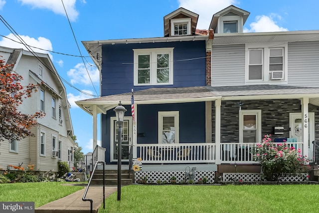 564 9th Ave, Prospect Park, PA 19076 - traditional style home with covered porch, a front lawn, and a shingled roof