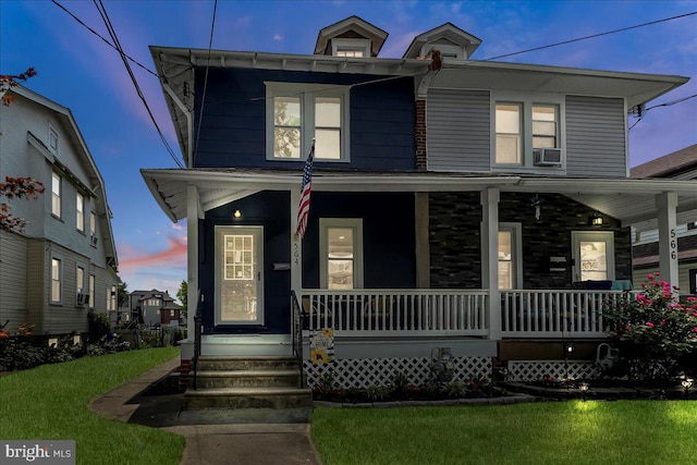564 9th Ave, Prospect Park, PA 19076 - view of front facade featuring covered porch and a front yard