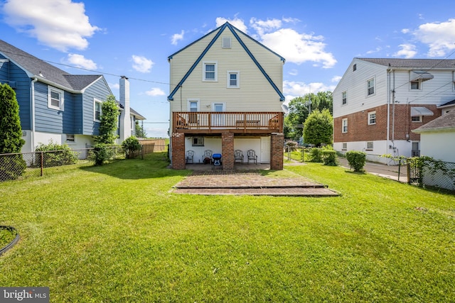806 S Beechfield Ave, Baltimore, MD 21229 - rear view of house with a wooden deck and a patio area