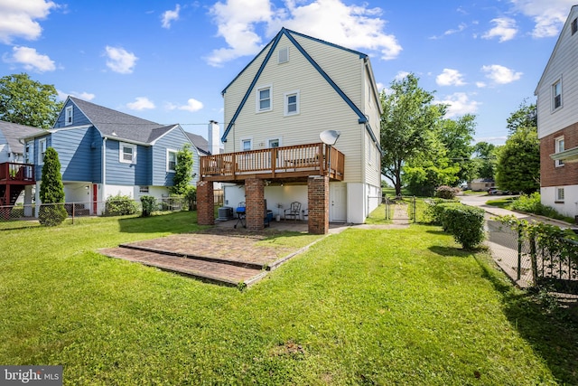 806 S Beechfield Ave, Baltimore, MD 21229 - rear view of house with a deck and a patio