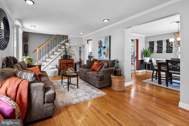 806 S Beechfield Ave, Baltimore, MD 21229 - living room with wood finished floors, stairway, recessed lighting, and ornamental molding