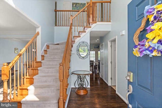 313 Indianhead Ct, Woodstock, VA 22664 - foyer entrance with baseboards, stairs, wood finished floors, and a high ceiling