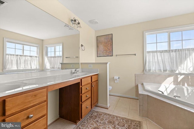 313 Indianhead Ct, Woodstock, VA 22664 - full bathroom featuring tile patterned floors, double vanity, a garden tub, and toilet