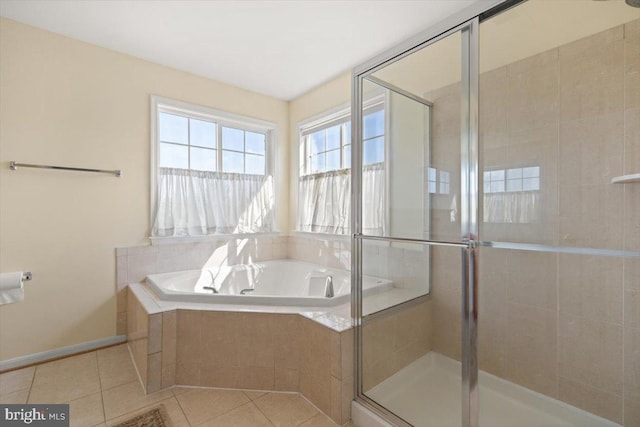 313 Indianhead Ct, Woodstock, VA 22664 - bathroom with tile patterned floors, a stall shower, and a bath