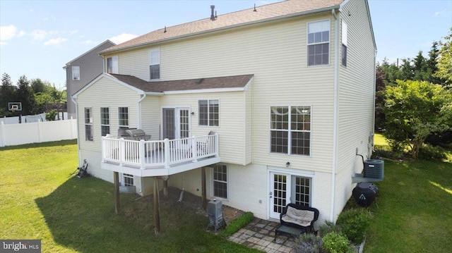 313 Indianhead Ct, Woodstock, VA 22664 - back of house featuring a wooden deck, cooling unit, and a shingled roof