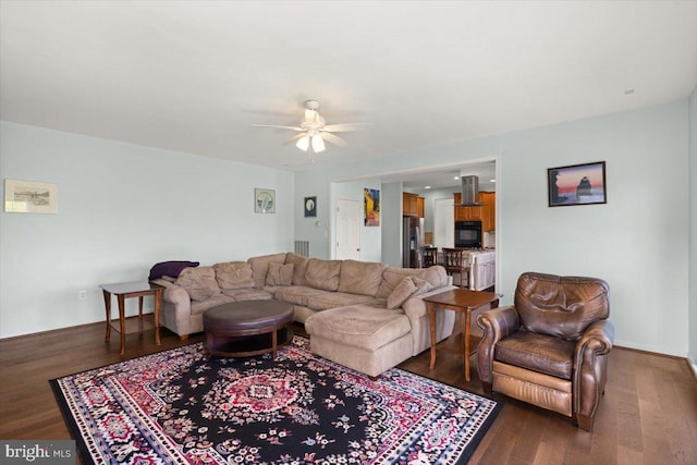 313 Indianhead Ct, Woodstock, VA 22664 - living area featuring a ceiling fan and dark wood-style floors