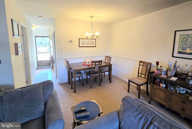 290 Hilltop Ln, Annapolis, MD 21403 - carpeted dining space with a chandelier and baseboards