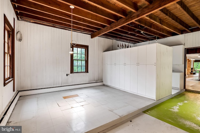 below grade area featuring baseboard heating