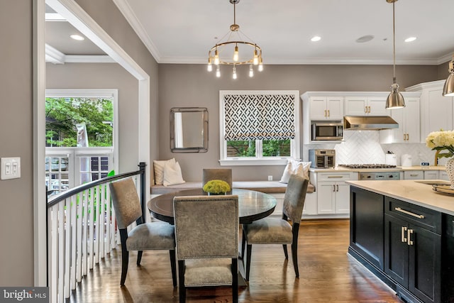 5526 Macarthur Blvd NW, Washington, DC 20016 - dining space featuring plenty of natural light, dark wood finished floors, crown molding, and recessed lighting