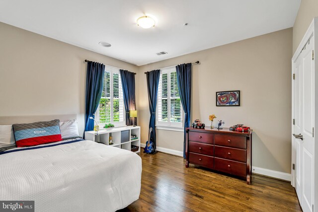 5526 Macarthur Blvd NW, Washington, DC 20016 - bedroom featuring wood finished floors, baseboards, and a closet