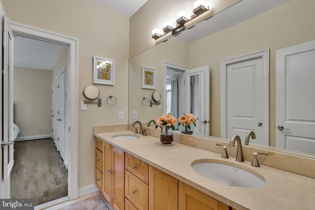5526 Macarthur Blvd NW, Washington, DC 20016 - full bathroom featuring double vanity and baseboards