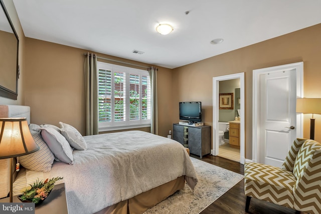 5526 Macarthur Blvd NW, Washington, DC 20016 - bedroom featuring wood finished floors and ensuite bathroom