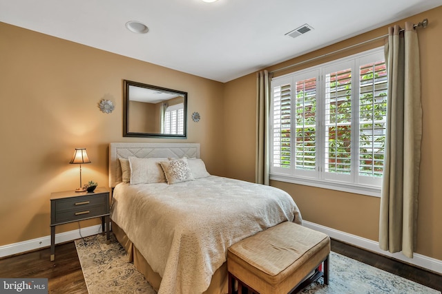 5526 Macarthur Blvd NW, Washington, DC 20016 - bedroom featuring baseboards and wood finished floors