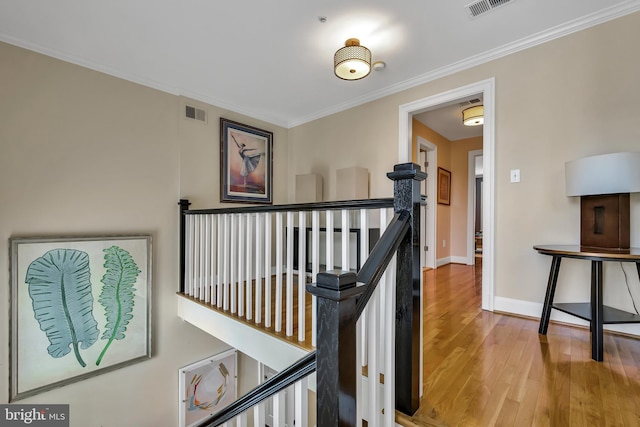 5526 Macarthur Blvd NW, Washington, DC 20016 - hall with an upstairs landing, wood finished floors, baseboards, and ornamental molding