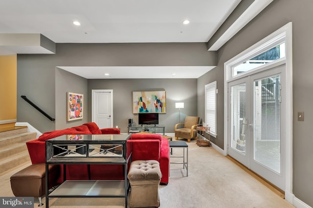 5526 Macarthur Blvd NW, Washington, DC 20016 - carpeted living area with baseboards, stairs, and recessed lighting