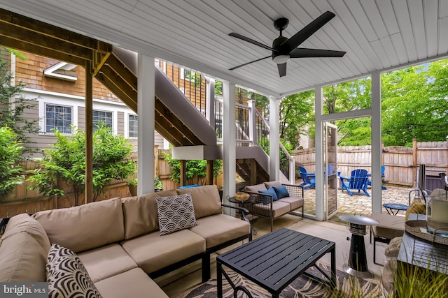 5526 Macarthur Blvd NW, Washington, DC 20016 - sunroom with outdoor lounge area, a ceiling fan, and plenty of natural light