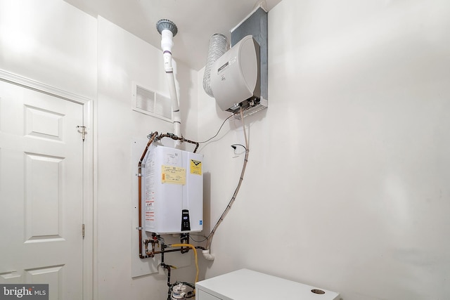 4 Augusta Dr, Little Egg Harbor Twp, NJ 08087 - utility room featuring water heater