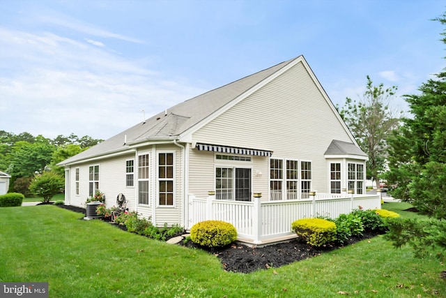 4 Augusta Dr, Little Egg Harbor Twp, NJ 08087 - rear view of house featuring a lawn and cooling unit