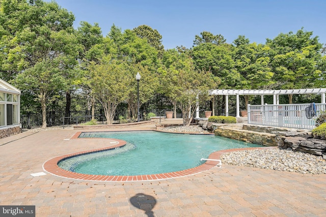 4 Augusta Dr, Little Egg Harbor Twp, NJ 08087 - view of swimming pool featuring a patio area, fence, a pergola, and view of scattered trees