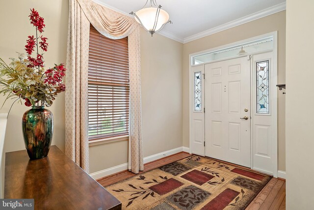4 Augusta Dr, Little Egg Harbor Twp, NJ 08087 - entrance foyer featuring wood finished floors, ornamental molding, and baseboards