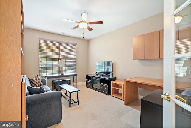 4 Augusta Dr, Little Egg Harbor Twp, NJ 08087 - living area featuring a ceiling fan, healthy amount of natural light, and light colored carpet