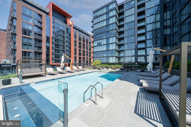 45 Sutton Sq SW Unit Ph11, Washington, DC 20024 - community pool featuring a patio area