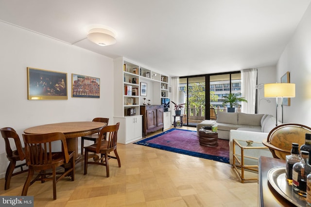 living room with floor to ceiling windows