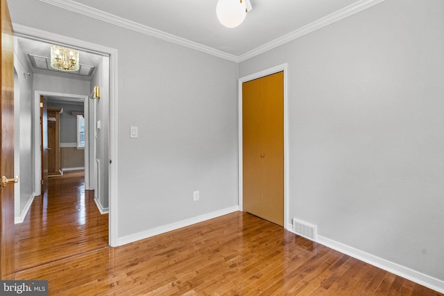15 Renee, Lawrence Township, NJ 08648 - unfurnished room featuring a chandelier, light wood-type flooring, crown molding, and baseboards