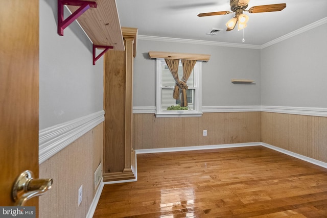 15 Renee, Lawrence Township, NJ 08648 - empty room featuring wood finished floors, ceiling fan, a wainscoted wall, ornamental molding, and baseboards