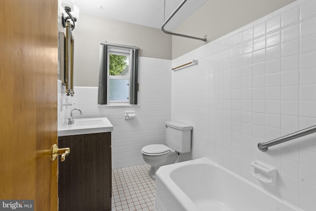 15 Renee, Lawrence Township, NJ 08648 - full bathroom with tile walls, toilet, vanity, tile patterned floors, and washtub / shower combination