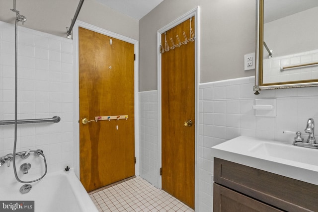 15 Renee, Lawrence Township, NJ 08648 - bathroom featuring tile walls, shower / bath combination, vanity, tile patterned floors, and a wainscoted wall