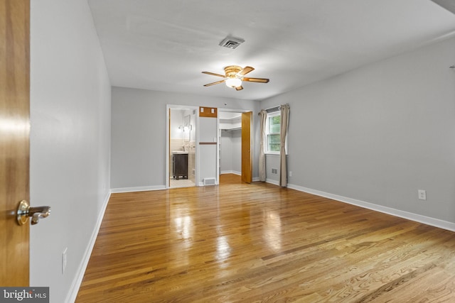 15 Renee, Lawrence Township, NJ 08648 - unfurnished bedroom featuring wood finished floors, a spacious closet, baseboards, a closet, and ensuite bath