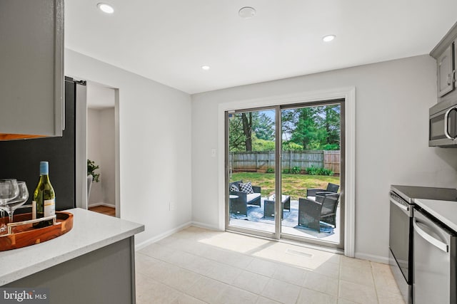 18165 Metz Dr, Germantown, MD 20874 - kitchen featuring gray cabinetry, stainless steel microwave, dishwasher, range, and recessed lighting